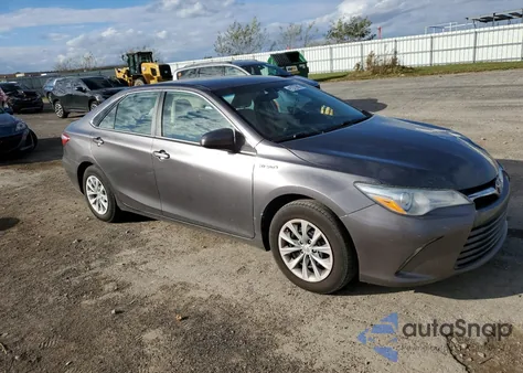 2015 Toyota Camry Hybrid из США, поврежденный, VIN 4T1BD1FK1FU173230
